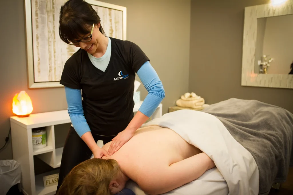 Registered massage therapist treating a patient at Active Care Health in Kelowna
